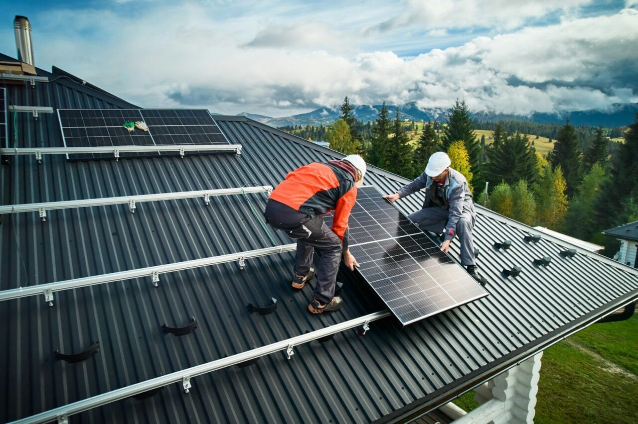 solar system installation on top of house